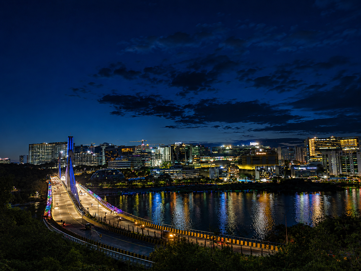 Durgam Cheruvu cable bridge and HITEC City skyline at night, Hyderabad